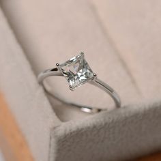 White topaz ring princess cut solitaire ring sterling | Etsy Square Cut Single Diamond Ring Gift, Gift Square Cut Single Diamond Ring, Promise Princess Cut Birthstone Ring, 14k White Gold Solitaire Princess Cut Jewelry, Princess Cut Solitaire Jewelry In 14k White Gold, 14k White Gold Solitaire Princess Cut Rings, Elegant White Topaz Princess Cut Wedding Rings, Classic White Gold Radiant Cut Topaz Ring, Classic Radiant Cut White Gold Topaz Ring