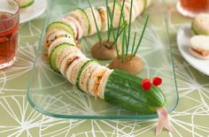 a caterpillar is sitting on a glass plate