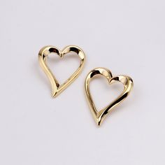 - Dimensions: height about 37.2mm. width about 56.2mm. thickness about 3.6mm. - Material: gold filled and brass. - Type: left right earrings. - Quantity: 1 Pair. - 0801-3469-1 Different batches, sizes and colors may be different slightly. If you need accurate size or color, please contact me. EU factory focuses on servicing brands unique and quality items with the smallest MOQ, if you need to custom or personalized, the factory and craftsmen are here. Always remove your gold jewelry before exercising, washing your hands, or showering.Polish lightly with a dry cloth.Store your accessories in a safe, dry place when not wearing them, including elements that protect them from daily exposure. Gold-tone Heart Shaped Earrings Gift, Heart-shaped Gold-tone Earrings For Gift, Gold Earrings For Anniversary On Valentine's Day, Elegant Gold Heart Earrings For Anniversary, Gold-plated Pierced Heart Earrings, Gold-plated Heart Earrings, Gold Open Heart Pierced Earrings, Gold Open Heart Earrings For Pierced Ears, Gold Heart Earrings For Anniversary