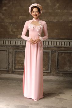 Traditional collar Fabric: Crepe, 3D flowers Raglan long sleeves Type: Modern ao dai