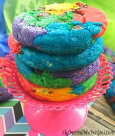 colorful cookies stacked on top of each other