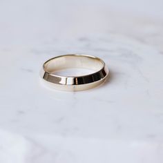 Wedding Ring Men, Men Wedding Band, Classic Wedding Band, Gold Wedding Band for Men, 14K Wedding Ring for Women, Gold Wedding Band, Mens Wedding Ring, His and Hers A triangle band ring made of K14 solid gold with softened edges for comfort. Engrave the ring with no extra cost. High polished wedding band 100% handcrafted. D E T A I L S ● Metal: 14K Solid Gold, 14K White Gold, 14K Rose Gold ● Finish: High polished ● Dimensions: 4.6mm in width x 1.7mm thick R I N G ∙ S I Z I N G For General Referen Triangle Wedding Band, Gold Wedding Band For Men, Wedding Ring Men, Ring For Women Gold, Men Wedding Band, Gold Triangle, Rings Mens Wedding Bands, Classic Wedding Band, Ring Men