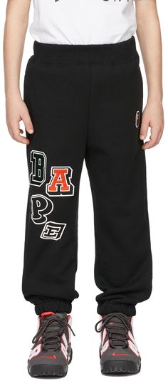 Straight-leg cotton fleece lounge pants in black featuring embroidered logo patches in multicolor. Text printed in white at leg. · Mid-rise · Three-pocket styling · Rib knit elasticized waistband and cuffs · Machine wash Model measures 49 / 124.5 cm tall and wears size 120. Supplier color: Black BAPE Size: child's height 90: 33.5-37.5 / 85-95 cm 100: 37.5-41.5 / 95-105 cm 110: 41.5-45.5 / 105-115 cm 120: 45.5-49 / 115-125 cm 130: 49-53 / 125-135 cm 140: 53-57 / 135-145 cm 150: 57-61 / 145-155 cm Bape Kids, Pants Straight, Kids Pants, Cotton Fleece, Lounge Pants, Patch Logo, Rib Knit, Straight Leg, Sweatpants