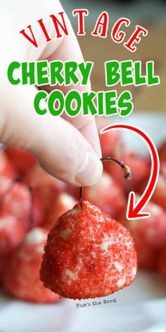 a hand holding a cherry bell cookie with the words vintage cherry bell cookies below it