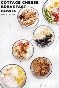 four bowls filled with different types of breakfast foods on top of a marble countertop