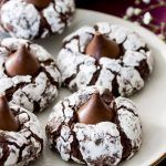 chocolate covered cookies on a white plate