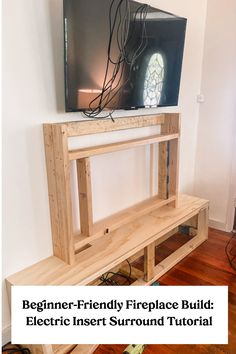 Beginner-friendly DIY wood fireplace frame with an electric insert and mounted TV. How To Build A Electric Fireplace Surround, Build Fireplace Hearth, Installing Electric Fireplace, Electric Fireplace Diy Surround, How To Install An Electric Fireplace, Build Electric Fireplace, Build A Fireplace In Your Home, Easy Diy Electric Fireplace Surround, Diy Freestanding Fireplace