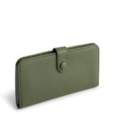 Meet our Tab Wallet, the perfect blend of style, functionality and organization. Crafted from high-quality materials, this spacious wallet offers ample room for your cards, cash, coins and more, keeping everything neatly organized and easily accessible. Whether you're running errands, heading to work or traveling, our wallet offers the perfect combination of functionality, durability and style to meet your everyday carry needs. Vera Bradley Tab Wallet in Green Modern Wallets With Interior Card Slots For Everyday Use, Modern Trifold Wallets For Everyday Use, Travel Bifold Coin Purse With Snap Closure, Versatile Bifold Card Holder For Daily Use, Versatile Leather Wallet With Interior Card Slots, Versatile Leather Wallets With Card Slots, Versatile Rfid Blocking Card Holder For Daily Use, Bifold Clutch With Interior Card Slots For Daily Use, Versatile Leather Card Holder