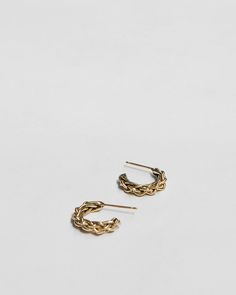 These delicate and perfect everyday hoops are twisted by hand with two strands of soft wax and then cast into recycled gold. Hoops measure 5/8" in diameter, available in 10k or 14k yellow gold, with 14k posts and backs.  Availability: Currently in stock and ready to ship. 14k Yellow Gold Twisted Earrings, Twisted 14k Yellow Gold Earrings, Handmade 14k Yellow Gold Huggie Earrings, Twisted Yellow Gold Hoop Earrings For Everyday, Everyday Twisted Yellow Gold Hoop Earrings, Everyday Yellow Gold Twisted Hoop Earrings, Delicate 14k Yellow Gold Hoop Earrings, Twisted 14k Yellow Gold Hoop Earrings, Modern Twist Yellow Gold Hoop Earrings For Everyday