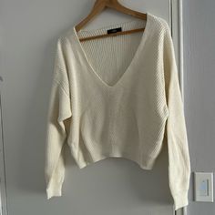 Lulu’s V Neck Cropped Sweater Beautiful Cream Color (See Last Photo) Size S Nwot Never Worn Excellent Condition Smoke Free And Pet Free Home Send Me Your Offer Elegant Cream V-neck Sweater, Cream Cropped Sweater, Cream Knit V-neck Sweater, Casual Cream Long Sleeve V-neck Sweater, White V Neck Sweater, Cozy Cream V-neck Long Sleeve Sweater, Cream Textured Knit V-neck Sweater, Photo Size, V Neck Sweater