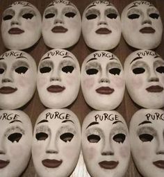 many white masks with words written on them