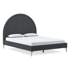 a bed with a gray headboard and white sheets on it's sides, in front of a white background