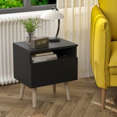 a black end table sitting next to a yellow chair in front of a white radiator