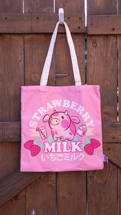 This heavy, printed canvas tote with a cotton lining is an excellent everyday bag. Whether you're heading to the beach, park, pool, or your favorite summer spot, this bag can carry everything you need for your daily travels. It's very durable and features a sturdy strap. Strawberry Milk Cow, Weekly Planner Notepad, Japanese Writing, Strawberry Cow, Pinup Art, Art Kawaii, Planner Notepad, Cute Canvas, Beach Park