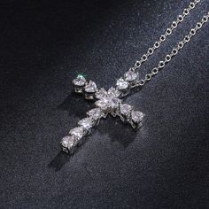 This Delicate Heart Crystal Cross Pendant necklace is classified as Fashion Jewelry or as Luxury jewelry, express elegant personal style. The Cross Pendant looks aesthetic, to give as a gift or wear on life's most precious days. Glistening Pendant is a classy and chic choice that goes with every complexion and adds a touch of beauty to every style. You can wear this Delicate Heart Crystal Cross Pendant Necklace on its own or partner with classic silhouettes for an express elegant personal style Looks Aesthetic, Female Necklace, Jewelry Delicate, Detailed Necklace, Crystal Cross, Heart Crystal, Handmade Fashion Jewelry, Geometric Pendant, Cross Pendant Necklace