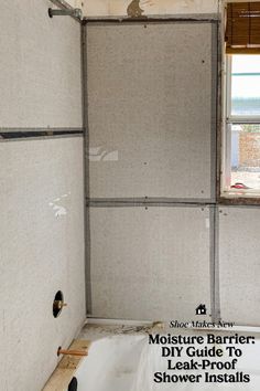 the inside of a bathroom being remodeled with drywalling and shower walls in place