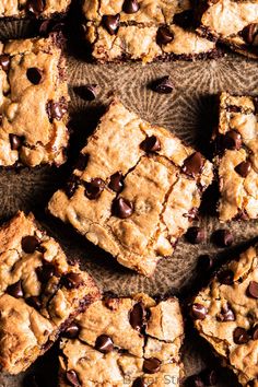 chocolate chip cookie bars cut into squares and placed on top of each other with one bite taken out