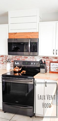 a black stove top oven sitting inside of a kitchen next to a microwave and counter