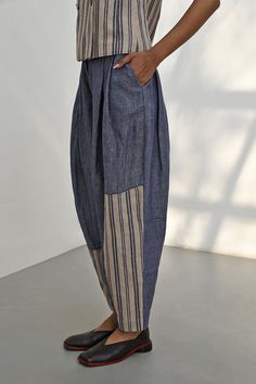 Step out in style with these baggy patchwork panelled pants, enhanced by hand-stitch details along the seams. Pair them with any of our jackets or gilets to create a bold statement look that's both comfortable and eye-catching. Note: Top worn by model is for styling purposes and can be purchased separately. Blue Carrot, Carrot Pants, Hand Stitch, Modern Woman, Hand Stitching, In Style, Contemporary Style, To Create, Pants