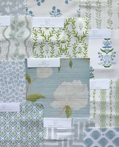 many different types of fabric with flowers and leaves on them, all in shades of blue