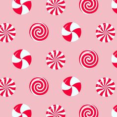 red and white candy canes on a pink background seamless wallpaper pattern photo