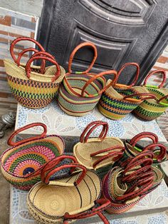 several baskets are lined up on a table