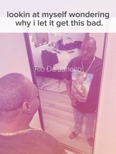 a man standing in front of a mirror with a book on his chest and the caption, lookin at my self wondering why i let it get this bad