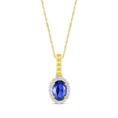 She'll adore the classic and modern touches in this bright and sparkling necklace. Crafted in 10K yellow gold An oval-cut blue lab-created sapphire is the stunning centerpiece A halo of white lab-created sapphires adds sparkle The beaded bail lends a touch of whimsy to the look Te 18-inch rope chain secures with a spring ring clasp Blue Oval Diamond Cut Necklace, Oval Blue Diamond Cut Necklace, Brilliant Cut Lab-created Sapphire Necklace, Brilliant Cut Lab-created Sapphire Necklaces, Blue Oval Pendant Necklace With Diamond Cut, Classic Necklaces With Lab-created Sapphire Gemstone, Elegant Lab-created Sapphire Birthstone Necklaces, Sapphire Pendant Jewelry With Lab-created Sapphire, White Lab