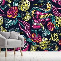 colorful skulls and roses wallpaper mural in a living room with a grey chair on the floor