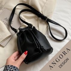 🎀 You will love this Minimal Casual Crossbody Bag that we produce from Leather! 🎀 This Mini Leather Bucket Bag specially designed for you will be indispensable for your outfit! 🎀 You can easily adjust the shoulder strap to the length you want. (Maximum 110cm = 43 Inches) 🎀 It is completely made of Synthetic leather, no animals were harmed in its production. 🎀 No chemicals harmful to health are used in the production of our products, we produce our products in the light of the sustainability Handheld Mobile Phone Bucket Bag For Gift, Trendy Drawstring Bag With Adjustable Strap For Daily Use, Trendy Pouch Bucket Bag As Gift, Rectangular Black Bucket Bag For Gift, Trendy Bucket Bag With Adjustable Strap As Gift, Black Drawstring Bag For Daily Use, Black Pouch Bucket Bag For School, Trendy Bucket Pouch For Daily Use, Black Shoulder Bucket Bag Gift