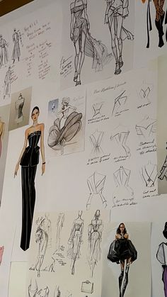 a wall covered in drawings and sketches of women's dresses