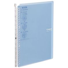 a blue spiral bound notebook with the word compte written on it's side