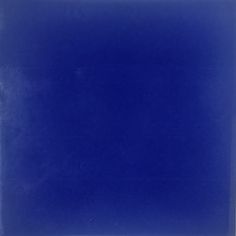 an image of a blue square tile with white lines on the bottom and bottom half