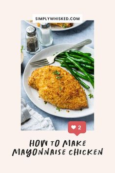 a white plate topped with chicken and green beans