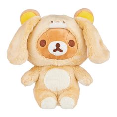 a brown and white stuffed animal with ears