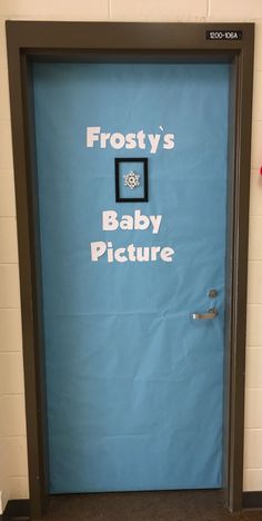 a blue door with frosty's baby picture on it