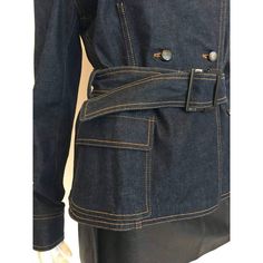 Description: Yves Saint Laurent dark blue denim jacket Double-breasted Mandarin collar Button detailing Two front patch pockets Belted Shoulder to shoulder: 17" Sleeves: 26" Underarm to underarm: 40" Waist: 34" Total length: 22" Circa 1990's Details: Size: Approx. M/L Color: Dark BlueMaterial: 98% Cotton, 2% Spandex Condition: Excellent Brand: Yves Saint Laurent Shipping: Standard: $9.95Expedited: $19.95 Denim Blue Blazer With Patch Pockets, Fitted Denim Jacket With Flap Pockets For Work, Denim Blue Workwear Jacket With Pockets, Denim Outerwear With Multiple Pockets For Work, Denim Blue Jacket With Pockets For Work, Fitted Denim Jacket With Patch Pockets For Work, Fitted Blue Denim Jacket With Flap Pockets, Fitted Denim Blazer With Patch Pockets, Fitted Denim Utility Jacket For Workwear