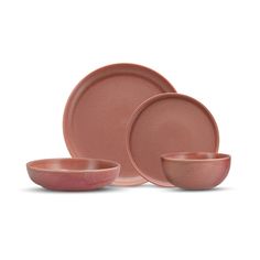 pink dinnerware set on white background