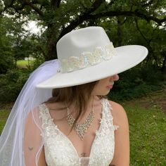 Wedding Fedora Hat White Felt with Scalloped Hatband of White and Iridescent Sequins. One of a Kind. The 34 Inch Veil is Two Shear Layers. A truly one-of-a kind hat for your special occasion This is a perfect Hat and Veil for a Church, Garden, Casual or Formal Wedding. This Accessory would complement any Bride and Her Wedding. One size fits most - Soft elastic band inside hat adjusts to most hat sizes. White Fitted Felt Hat With Curved Brim, Fitted White Felt Hat With Wide Brim, Fitted White Wide Brim Felt Hat, White Fitted Wide Brim Felt Hat, White Adjustable Flat Brim Costume Hats And Headpieces, White Brimmed Felt Hat For Party, White Fedora Felt Party Hat, White Fedora Felt Hat For Party, White Fedora Hat For Party