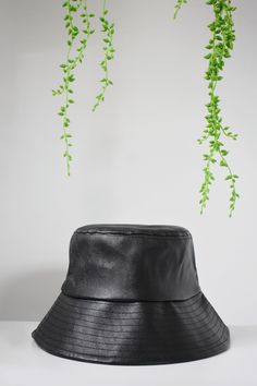 black vegan leather bucket hat Casual Leather Hats For Spring, Trendy Black Bucket Hat With Short Brim, Everyday Black Wide Brim Bucket Hat, Black Wide Brim Bucket Hat For Everyday, Black Bucket Hat For Spring Everyday Wear, Trendy Black Leather Hat, Trendy Leather Hats With Curved Brim, Black Leather Wide Brim Hat, Chic Black Bucket Hat For Spring