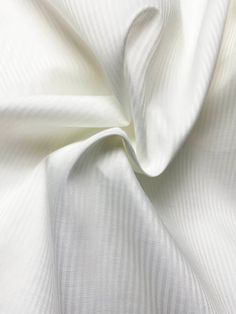 White Herringbone Pocketing Also know as Silesia, named after a province in Prussia, this fabric is used to make the pockets and inner waistbands of trousers and skirts. This material is 95 GSM twill with a 80% polyester, 20% cotton composition. This fabric is machine washable or can be dry-cleaned and should be pressed with a medium temperature iron. All orders will be cut in one continuous piece and are shipped within 24 hours. Please note that we try our best to portray all fabric colors as a Classic Spring Wedding Bottoms, Classic Wedding Bottoms For Spring, White Cotton Wedding Pants, Elegant Cotton Pants For Wedding, Classic White Pants For Wedding, Suit Shorts, Suit Hat, Pants Gift, White Herringbone