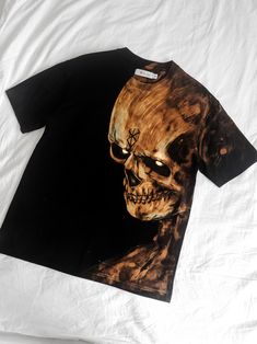 a t - shirt with an image of a skeleton on it