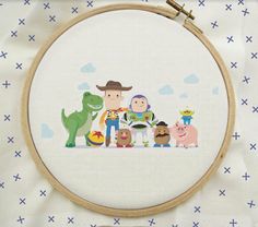 a cross stitch pattern with an image of toy story characters