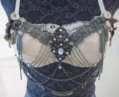 a bra with chains and beads on it