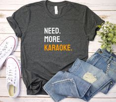 Karaoke Lover Shirt Please refer to our size chart in the thumbnails for exact dimensions. This classic unisex jersey short sleeve tee fits like a well-loved favorite. Soft cotton and quality print make users fall in love with it over and over again. These t-shirts have-ribbed knit collars to bolster shaping. The shoulders are tapered for a better fit over time. Dual side seams hold the garment's shape for longer.  .: Made with 100% Airlume combed and ring-spun cotton, a lightweight fabric (4.2 Tshirt Funny, Neat Style, Leisure Wear, Jersey Shorts, Semi Formal, Lightweight Fabric, Print Making, Crew Neckline