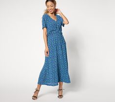 An elegant summer dinner party, a graduation celebration, or a conference sesh are just a small sampling of the places where this versatile crinkle knit midi dress wins for its combo of chicness and move-freely comfort. The others? Well, that's totally up to you! From Isaac Mizrahi Live!TM.\n\nFabrication: crinkle knit\nFeatures: short sleeves, front twisted knot design, waist and center-front seams, straight bottom hem\nFit: semi-fitted; follows the lines of the body with added wearing ease\nLe Chic Crinkle Texture Dresses For Vacation, Chic Vacation Dresses With Crinkle Texture, Summer Dresses With Crinkle Texture And Flowy Fit, Summer Flowy Dress With Crinkle Texture, Chic Textured Summer Maxi Dress, Flowy Crinkle Texture Summer Dress, Flowy Summer Dress With Crinkle Texture, Chic Summer Maxi Dress With Crinkle Texture, Summer Crinkle Texture Flowy Dress