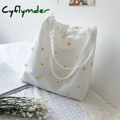 Shape: Casual TotePlace Of Origin: GUANG DONG ProvinceHandbags Type: Shoulder BagsTypes of bags: Shoulder BagsOrigin: CN(Origin)Main Material: CanvasClosure Type: zipperHardness: SOFTExterior: Solid BagStyle: CasualOccasion: VersatileGender: WOMENPattern Type: FloralNumber of Handles/Straps: TwoInterior: Cell Phone PocketDecoration: EmbroideryItem Type: Handbags Cute White Canvas Bag For Spring, Trendy Embroidered Summer Bag, Trendy White Embroidered Bags, Summer Shoulder Bag With Floral Embroidery For Daily Use, White Canvas Bag For Spring, White Canvas Shoulder Bag For Spring, White Shoulder Canvas Bag For Spring, Beige Floral Embroidered Bag For Summer, Everyday Summer Bag With Floral Embroidery