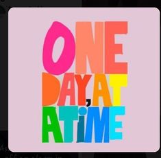 one day at a time sticker on the back of a cell phone with text