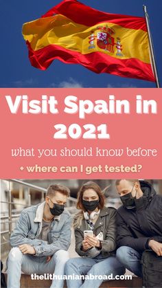 two people sitting next to each other in front of a flag and text that reads visit spain in 2021 what you should know before