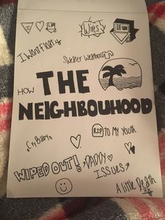 the neighborhood written on a piece of paper with other things to write and draw in it